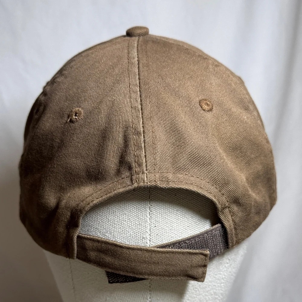 Brown Cotton Cap with Pink Horseshoe Design.